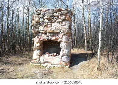 Old Stone And Brick Fireplace Remains In The Woods From An Old Ranch House