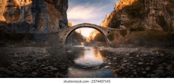 The old stone bridge called Kokkori in Epirus, Greece - Powered by Shutterstock