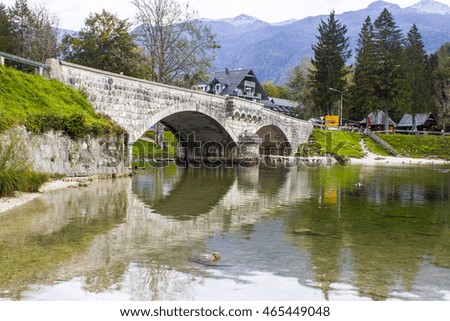 Old stone bridge on river Sava Bohinjka in Slovenia