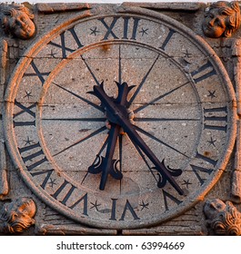 old stone clock - Powered by Shutterstock