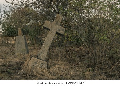 Old Stone Cross Grave Markers On Abandoned Cemetery