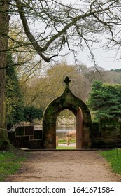 Old stone gate at Newstead Abbey gardens / park, ancestral home of Lord Byron near Nottingham, England, UK