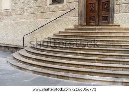 Old stone granite stairway, semi-circular historic steps