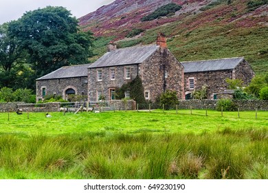 Old Stone House By The Lake In Lake District National Park, England, United Kingdom