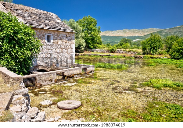 Old stone mill ruins on Cetina river source,\
Dalmatian Zagora region of\
Croatia
