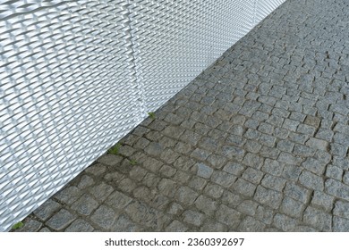 Old Stone Pavement Texture Background and Modern Metal Grid, Ancient Granite Cobblestone Road Pattern, Vintage Block Sidewalk Mockup, Paved Roadway Banner with Copy Space for Text - Powered by Shutterstock