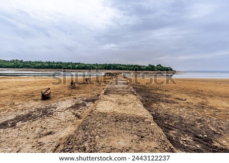 Old stone pier on a dry river