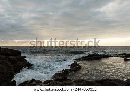 Old stone pier in sunset time at Tenerife, Canary Islands, Spain
