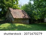 An old stone springhouse on an old farm in the forest 