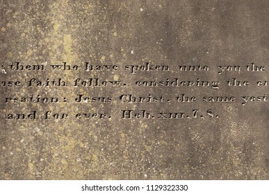 Old stone surface with the engraved words from Hebrews 13:7-8, Holy Bible - Shutterstock ID 1129322330