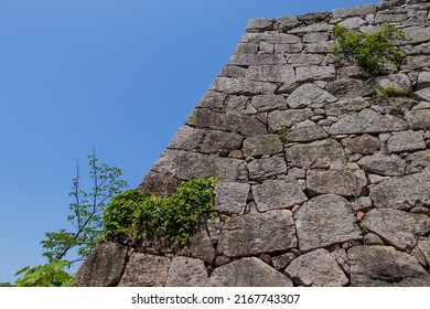 Old Stone Wall And Blue Sky