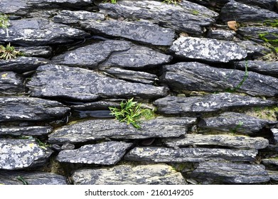 Old stone wall texture background - Shutterstock ID 2160149205