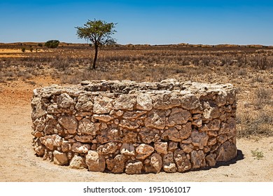 Old Stone Well For Drawing Water In Dry Kalahari, Northern Cape, South Africa