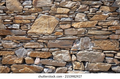 An Old Stonewall And Close Up.