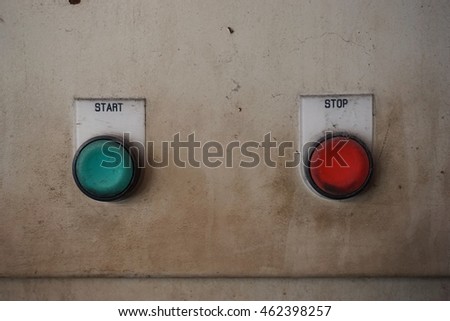 old stop and start button on the machine in factory