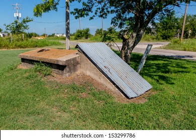 An Old Storm Cellar Or Tornado Shelter In Rural Oklahoma.