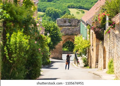 Old Street Of Domme Village In Dordogne Department, France