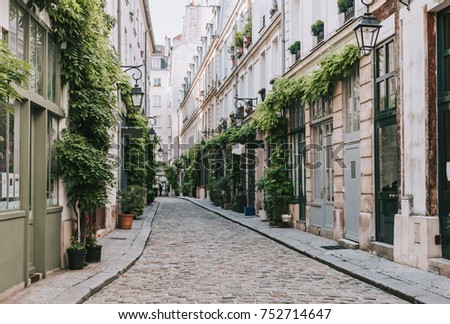 Old street in Paris, France. Cozy cityscape of Paris. Architecture and landmarks of Paris. 