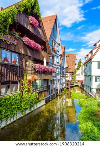 Old street in Ulm city, Germany. Nice view of beautiful residential houses in historical Fisherman`s Quarter. This place is famous landmark of Ulm. Scenery of ancient district of Ulm town in summer.