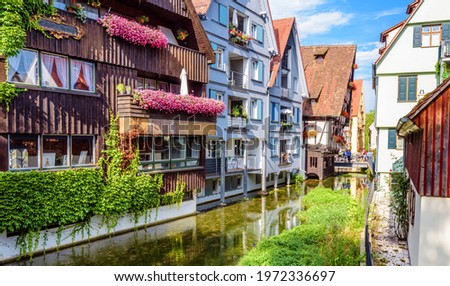 Old street in Ulm city, Germany. Nice view of beautiful houses in historical Fisherman`s Quarter. This place is famous landmark of Ulm. Panorama of ancient district of Ulm town in summer.