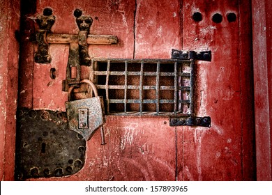 Old Strong Lock And Cast Iron Latch Locking Hardware With Speakeasy Window On A Medieval Dungeon Antique Wood Jail Door 