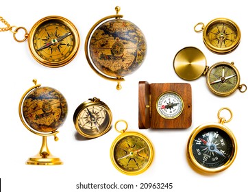 Old style compasses and globes isolated on white background