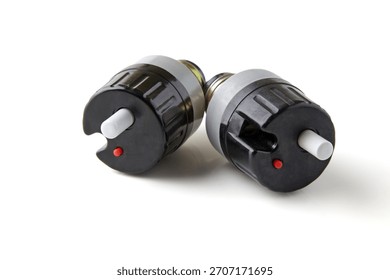 Old style electrical circuit breakers isolated on white background.