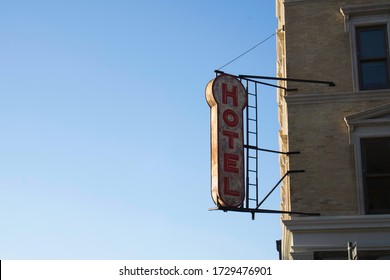 Old Style Looking Hotel Sign Attached To A Building. Reg Letters