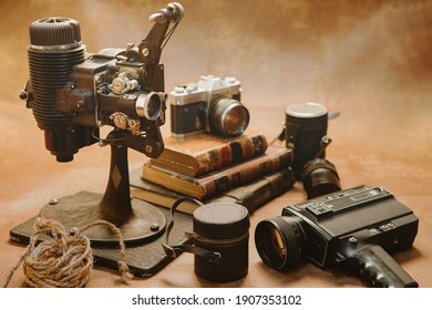 old style movie projector still life and photo camera