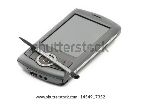 Old style PDA smartphone on isolated white background.