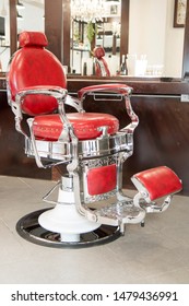 old style red barber chair