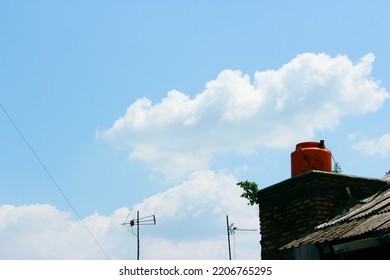 Old Style Tv Antenna With Blue Sky Background

