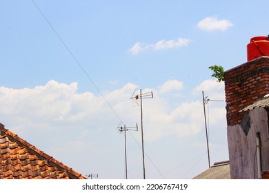 Old Style Tv Antenna With Blue Sky Background
