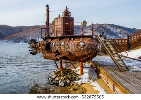 Old submarine near lake