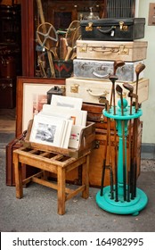 Old Suitcases And Golf Clubs In A Market In London