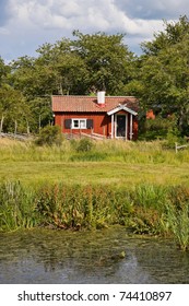 Old Swedish Summer Cottage At A Lake