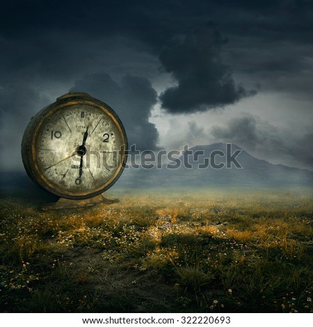 Old table clock in fantasy atmosphere
