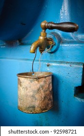 Old Tap With Rusty Mug - Water Supply Shortage