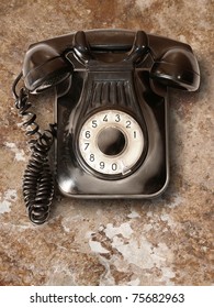 Old Telephone With Rotary Dial On Wall