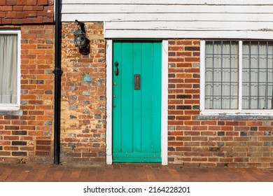 Old Terraced Cottage With Green Front Door In An English Village