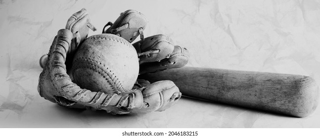 Old Texture Shows Vintage Sports Equipment With Baseball Glove And Ball Beside Wooden Bat For Sport Banner In Black And White.