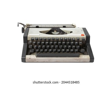 Old Thai traditional typewriter. Classic vintage antique manual typing machine isolated on white background. 19th century item.