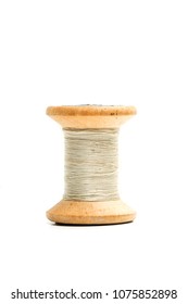 Old Thread Spool In A Cut Out View