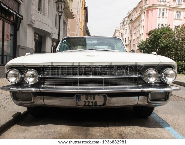 Old time Cadillac Coupe De Ville in\
street of Prague. Prague, Czech Republic - June\
2016
