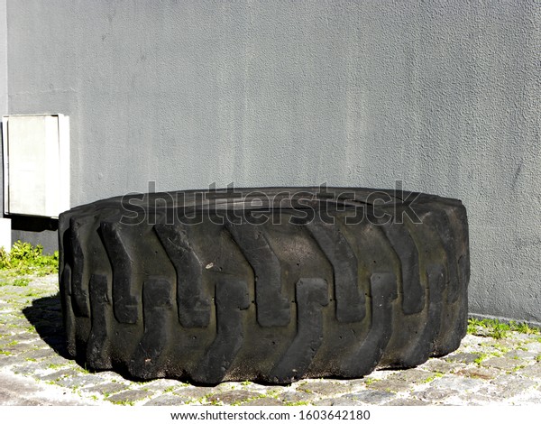 old tire of big\
tractor