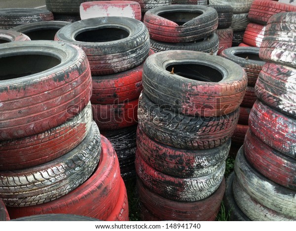 Old tires stacked -\
background texture