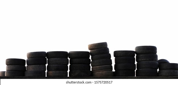 Old Tires Stacked Isolated On White Background. Tire Fitting, Pile Of Car Tires, Panorama