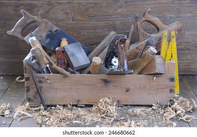 Old Toolbox On The Workbench In A Carpentry