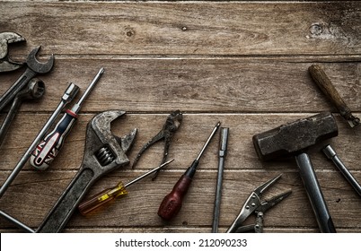 Old Tools On A Wooden Table