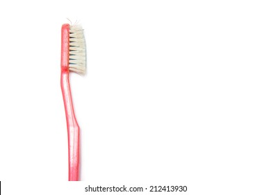 Old Toothbrush Isolated On White Background